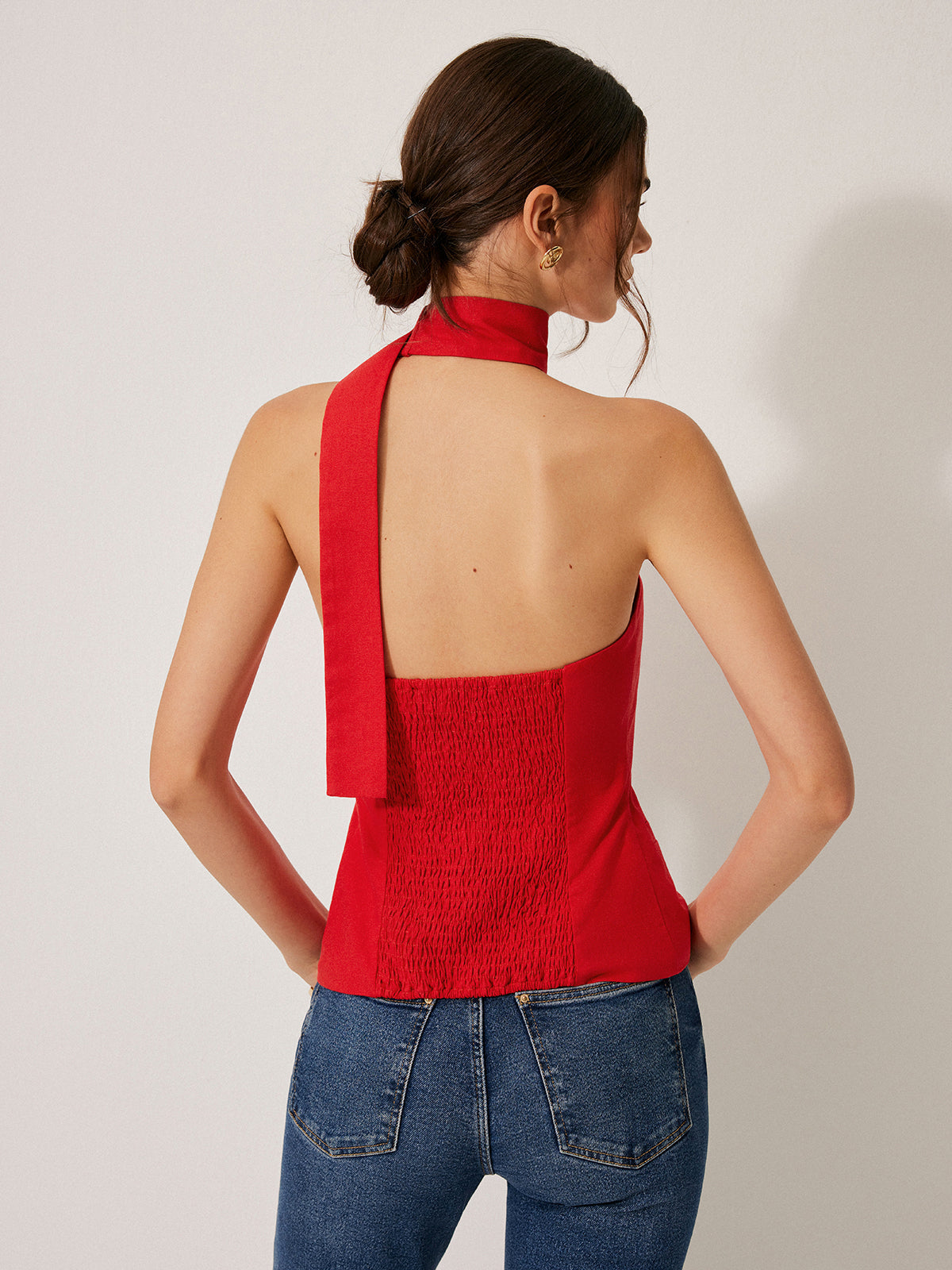 Top asymétrique à col noué