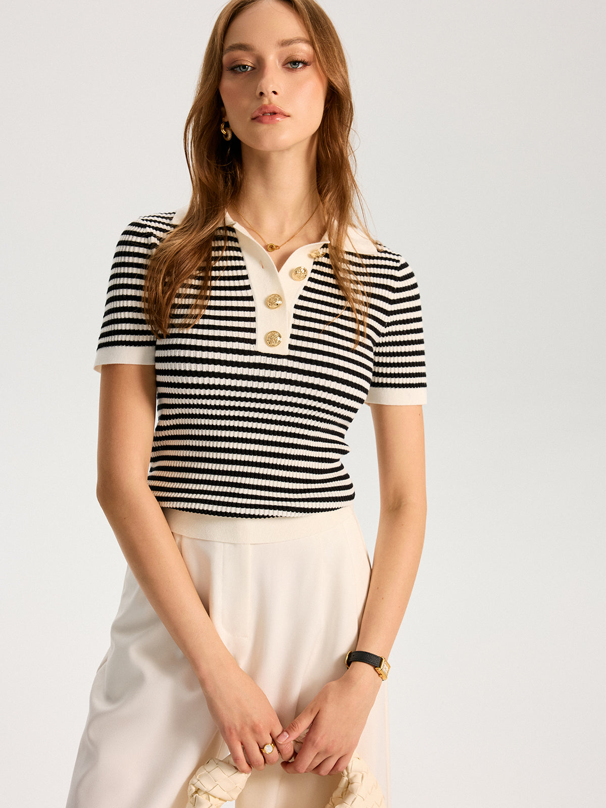 Polo rayé en maille élégante