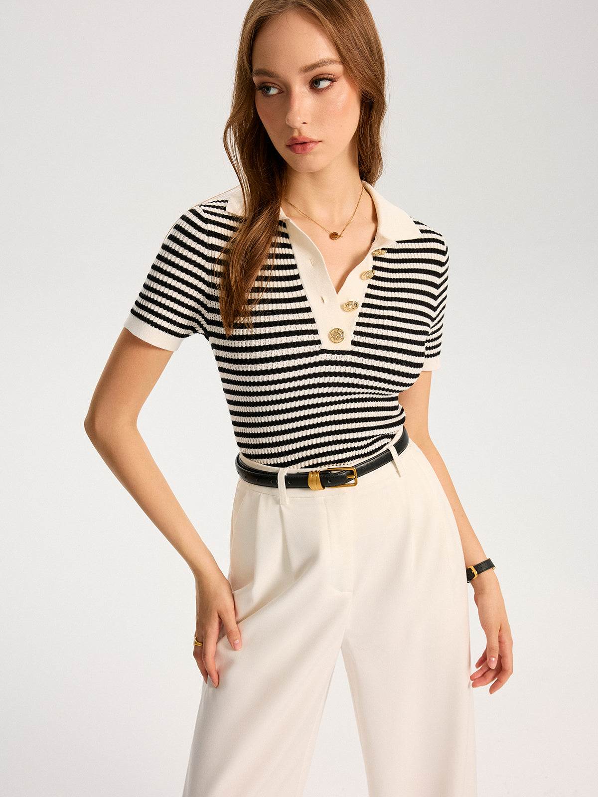 Polo rayé en maille élégante