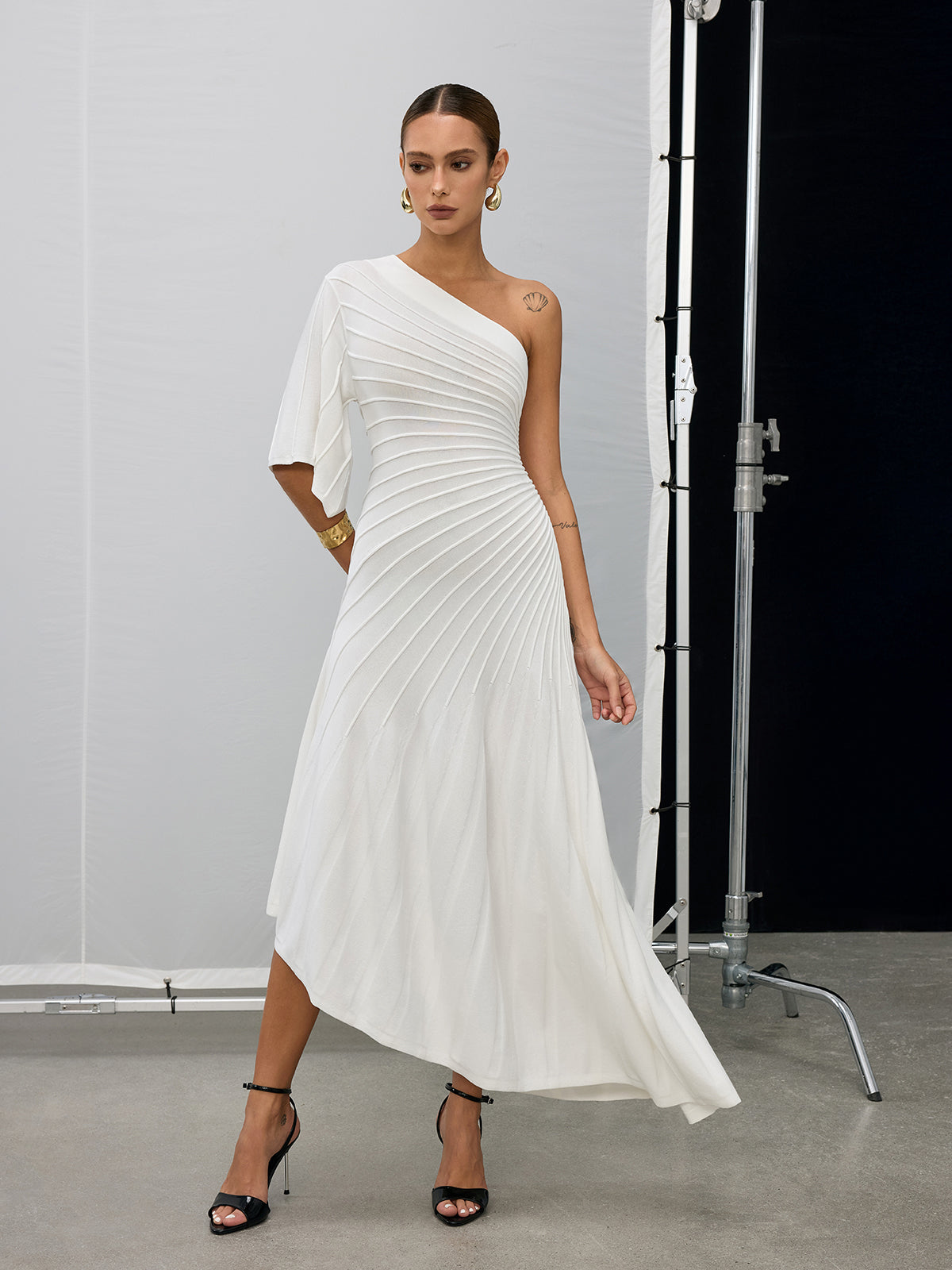 Robe asymétrique plissée